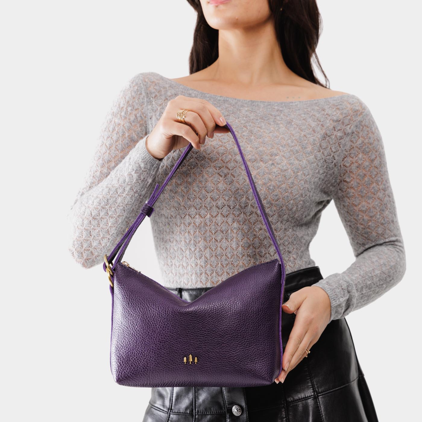 Empire Small | Petite slouchy leather shoulder bag with zipper opening and three metal tree emblems