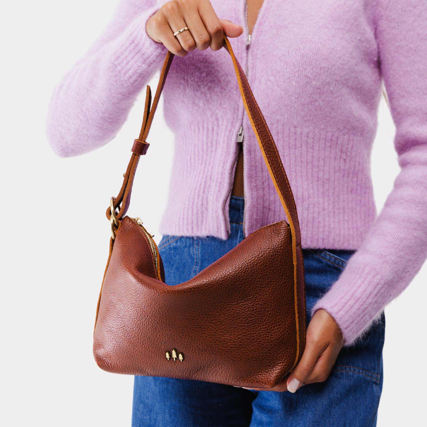 Nutmeg*Small | Petite slouchy leather shoulder bag with zipper opening and three metal tree emblems