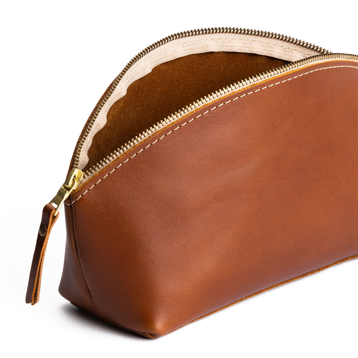 Honey | Spacious leather makeup bag with curved seams and top zipper