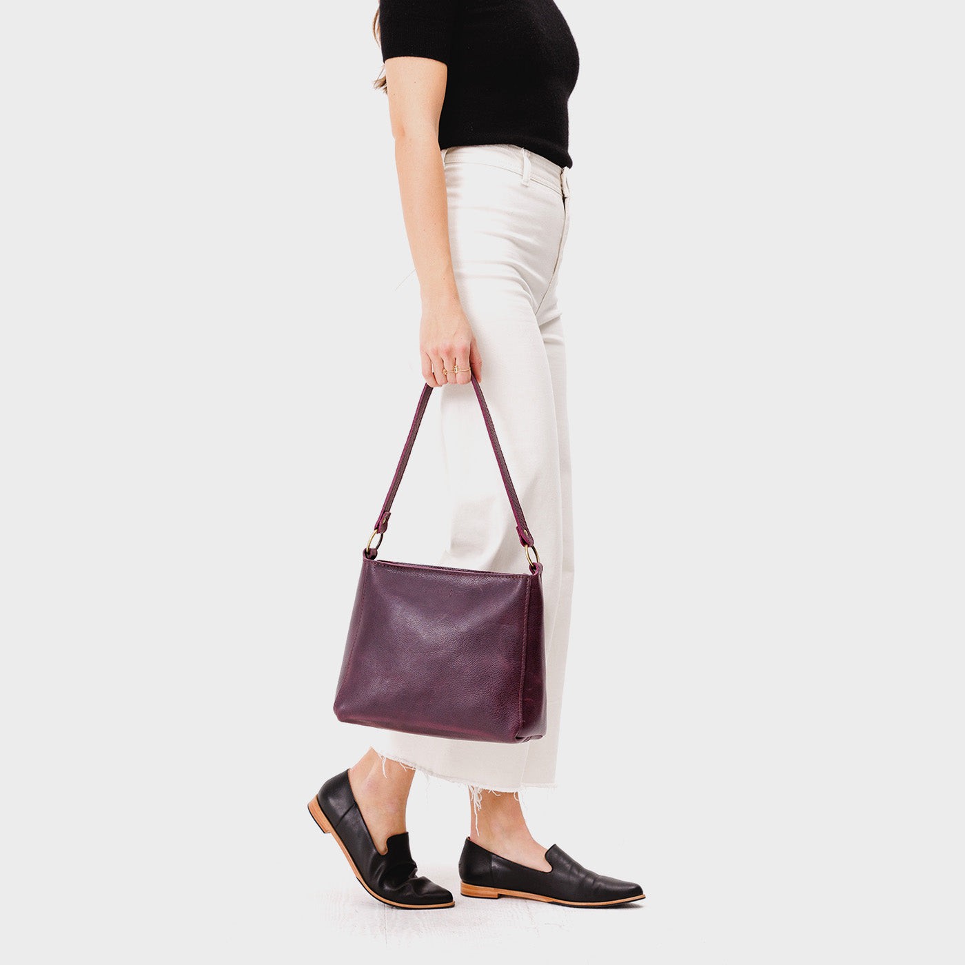  Plum | Triangular shoulder bag with antiqued brass finished hardware