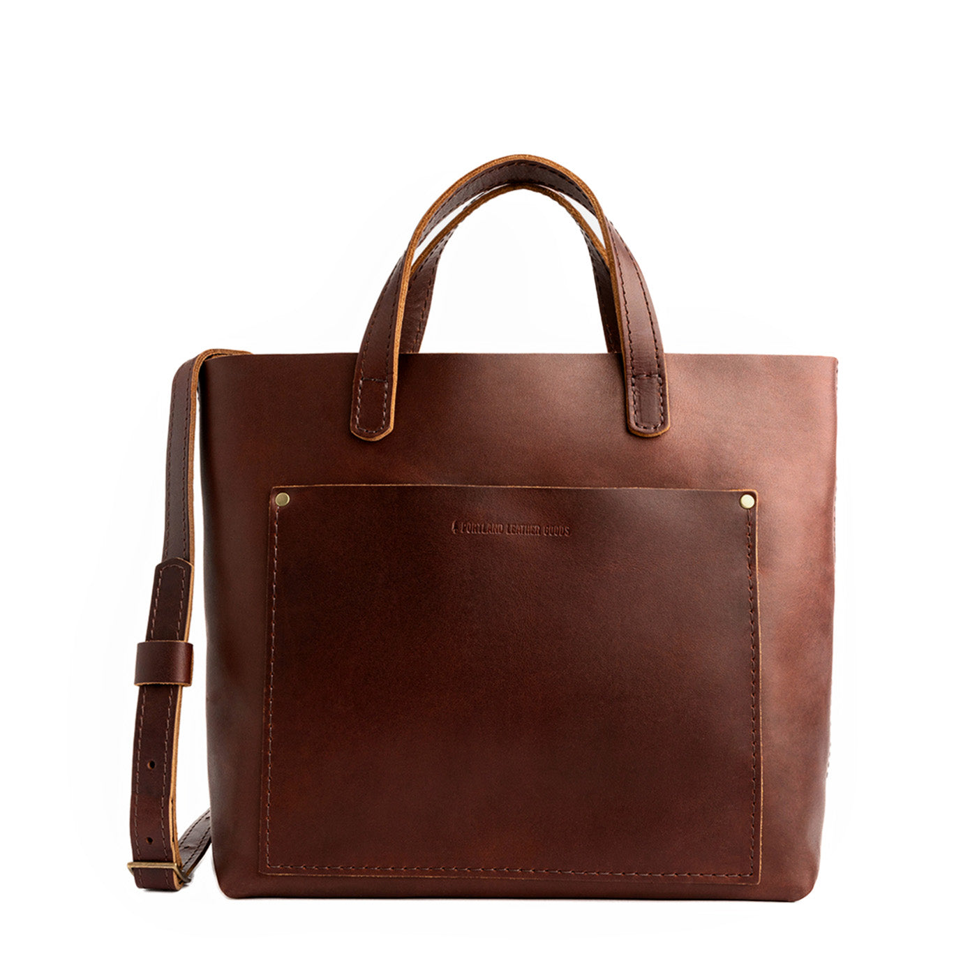 Cognac*Classic | Midsize crossbody tote with handles and a pocket