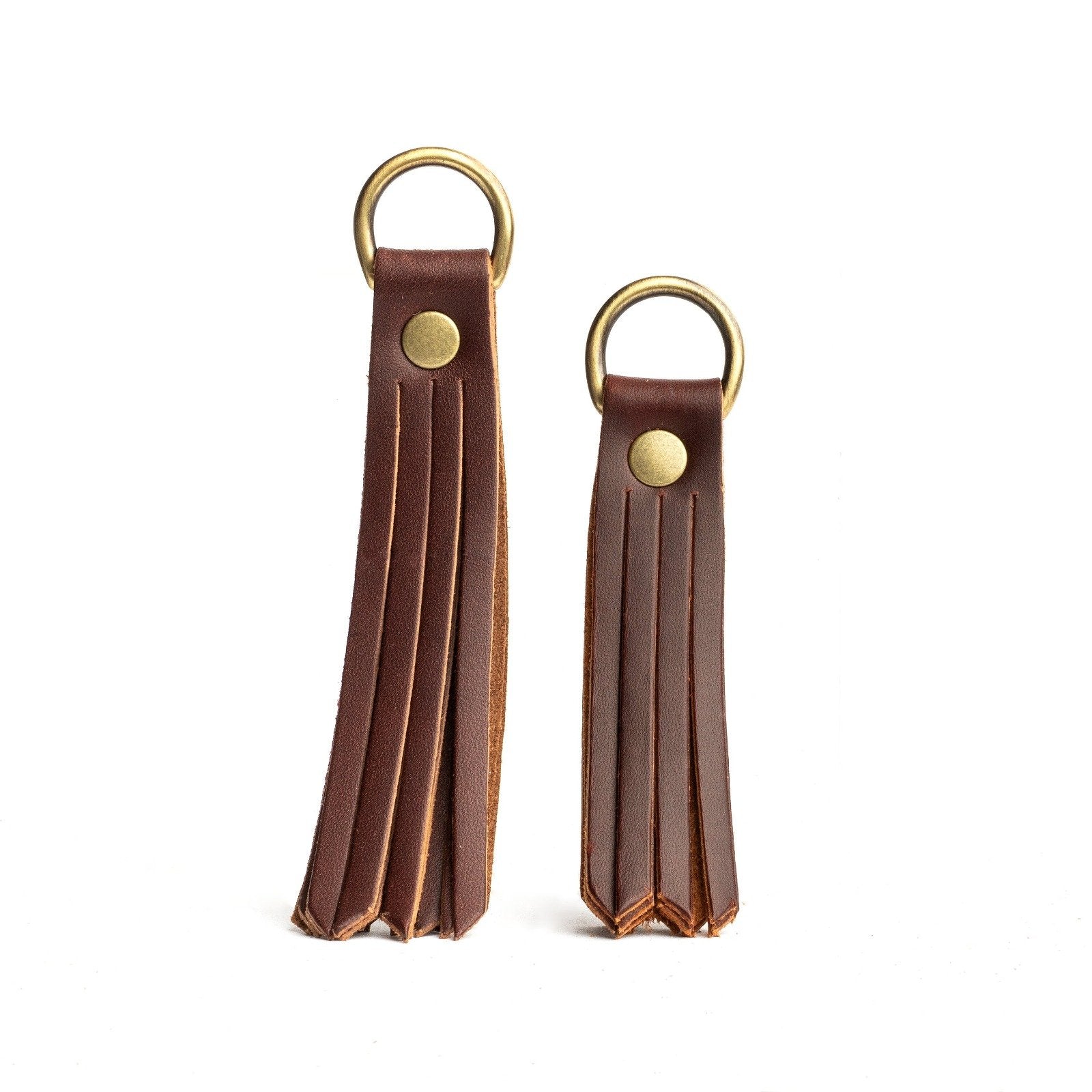 All Color: Cognac | slim leather tassel with brass ring