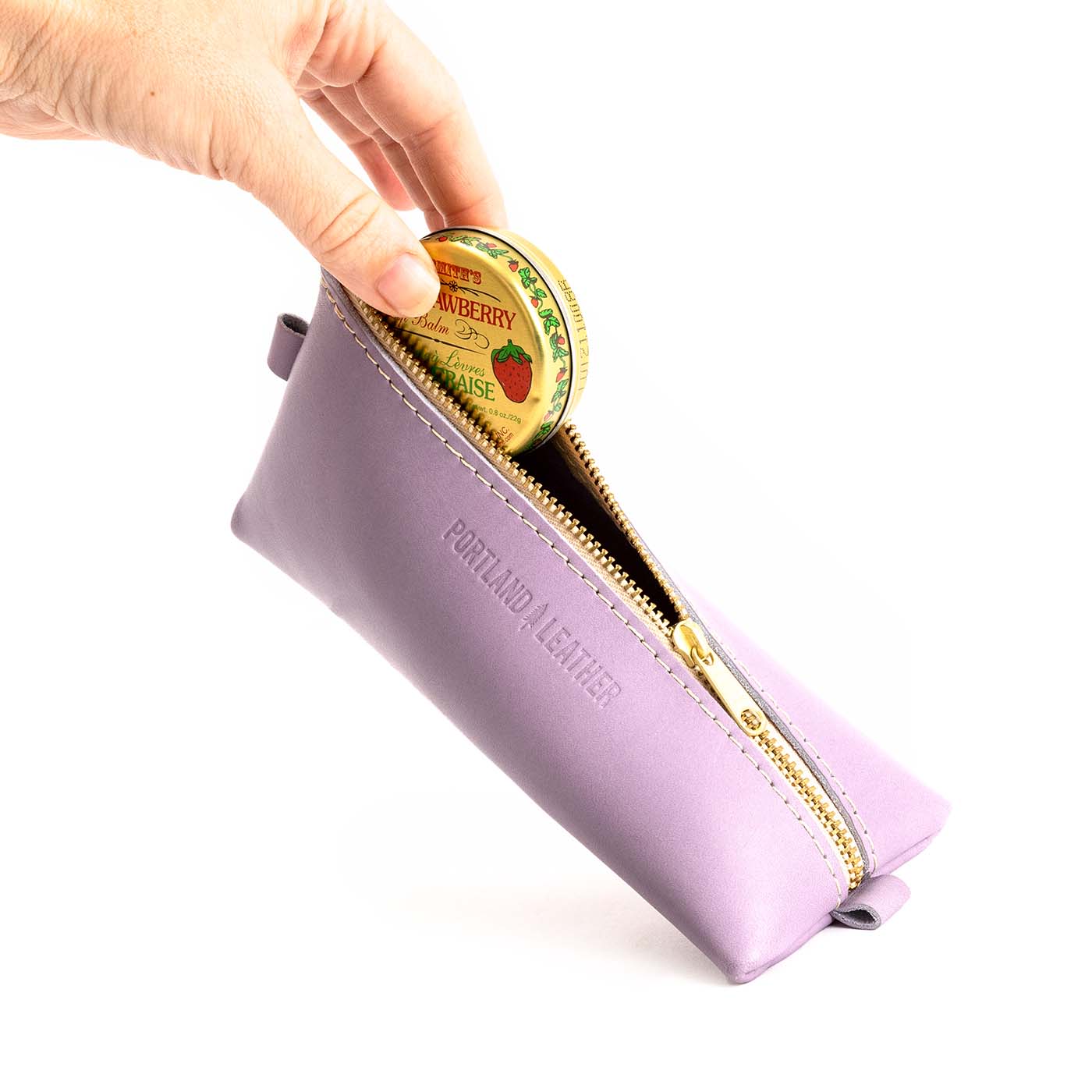 All Color: Lavender | Small leather triangular zip pouch